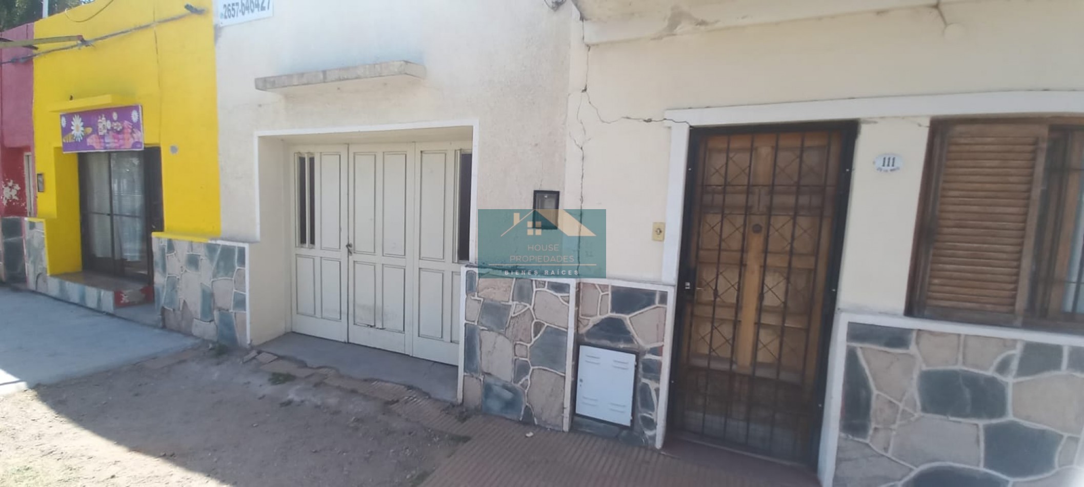 casa con local en venta